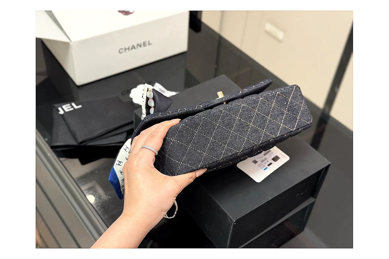 Chanel Quilted Flap Bag Black Navy QC reference photo showing black navy quilted leather body, flap structure, chain strap, and polished luxury hardware thumbnail 4