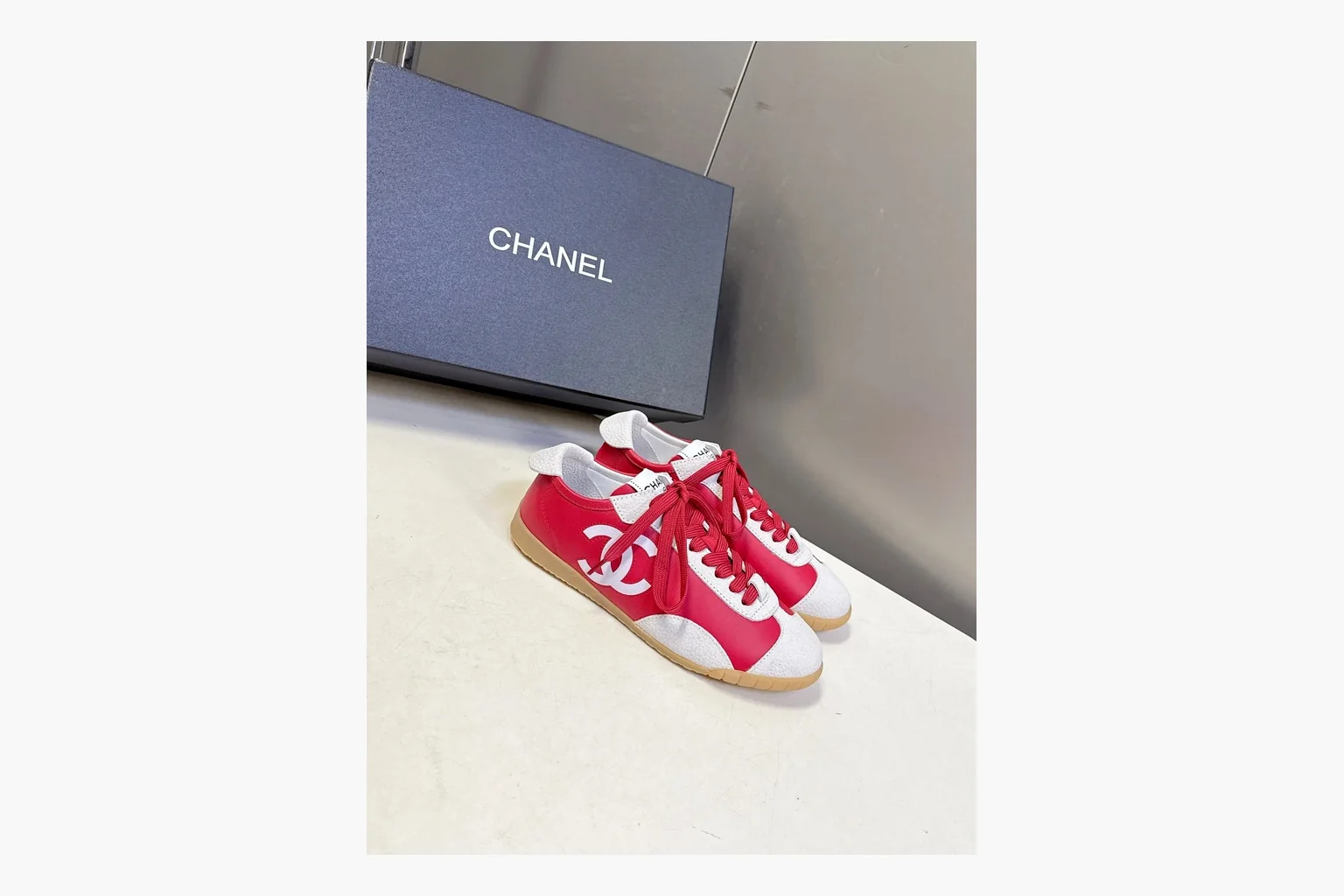 Chanel Red White Platform Sneaker QC reference photo showing red and white low-top upper, platform sole, leather-suede panel mix, box views, and rounded casual sneaker shape thumbnail 5
