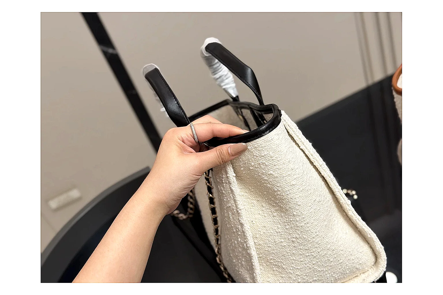 Chanel Tote Bag White Black QC reference photo showing white black canvas-leather tote body, open carry shape, structured handles, and branded luxury-bag details thumbnail 2