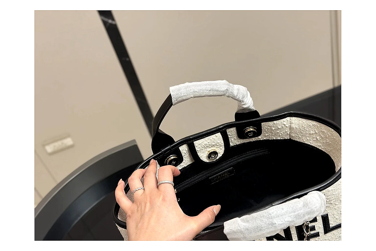 Chanel Tote Bag White Black QC reference photo showing white black canvas-leather tote body, open carry shape, structured handles, and branded luxury-bag details thumbnail 3