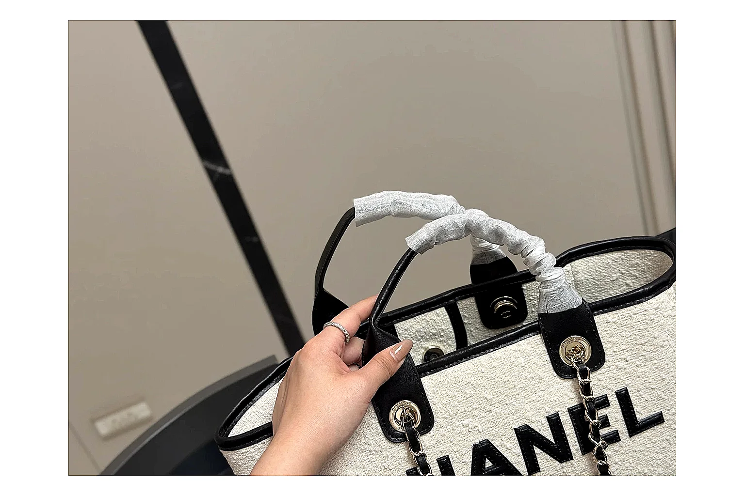 Chanel Tote Bag White Black QC reference photo showing white black canvas-leather tote body, open carry shape, structured handles, and branded luxury-bag details thumbnail 6