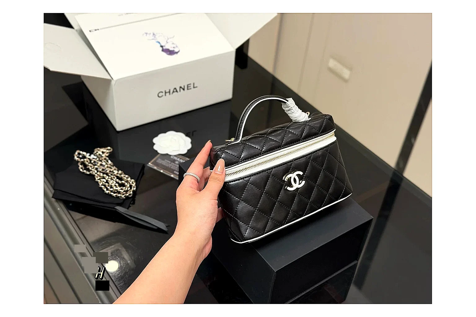 Chanel Wallet On Chain Black QC reference photo showing black quilted leather wallet body, chain strap, flap closure, and compact shoulder-bag profile