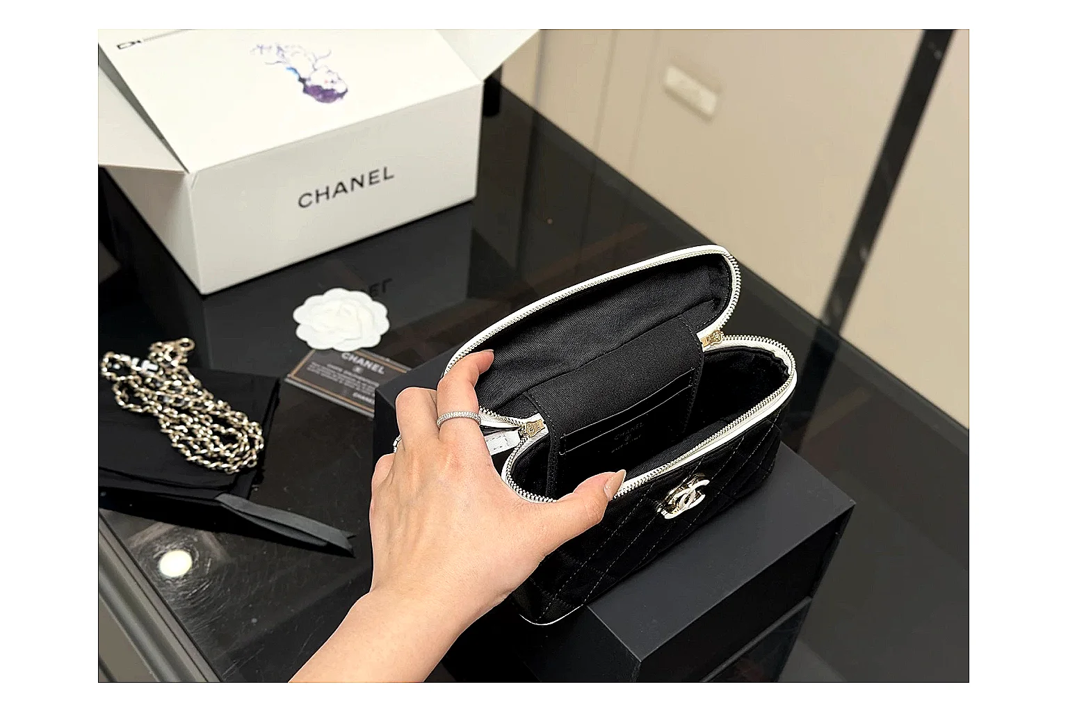 Chanel Wallet On Chain Black QC reference photo showing black quilted leather wallet body, chain strap, flap closure, and compact shoulder-bag profile thumbnail 3