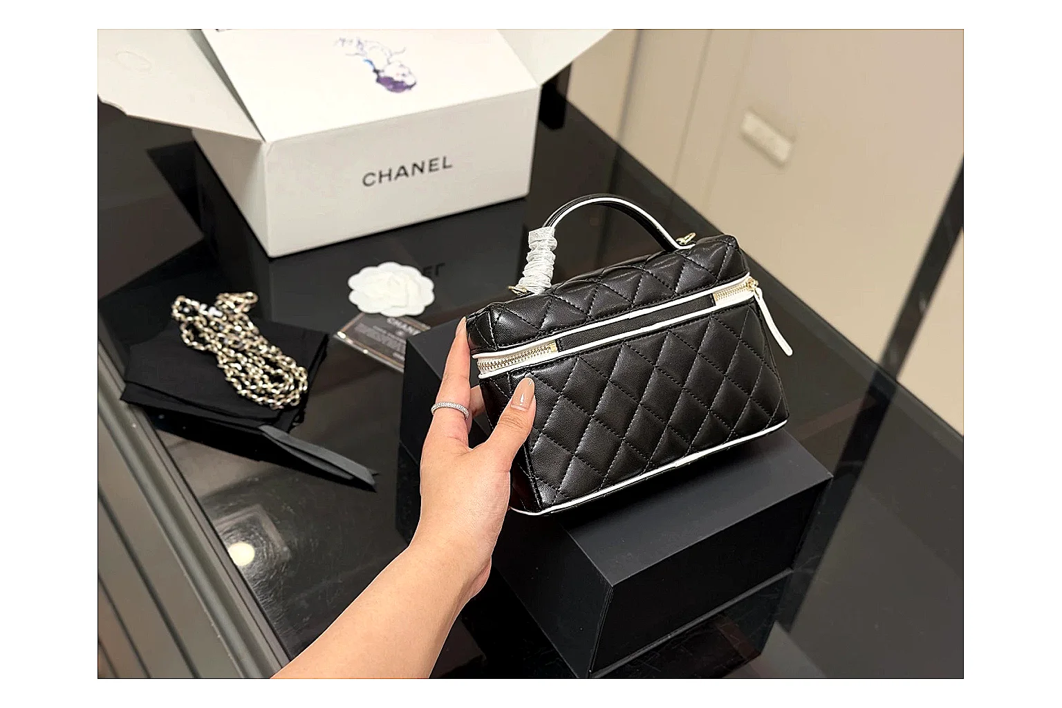 Chanel Wallet On Chain Black QC reference photo showing black quilted leather wallet body, chain strap, flap closure, and compact shoulder-bag profile thumbnail 4