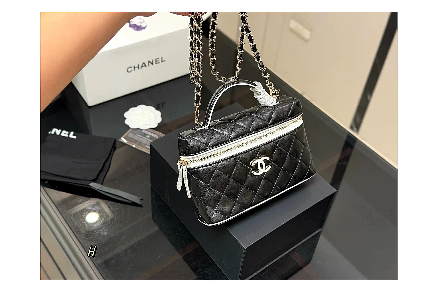 Chanel Wallet On Chain Black QC reference photo showing black quilted leather wallet body, chain strap, flap closure, and compact shoulder-bag profile thumbnail 5