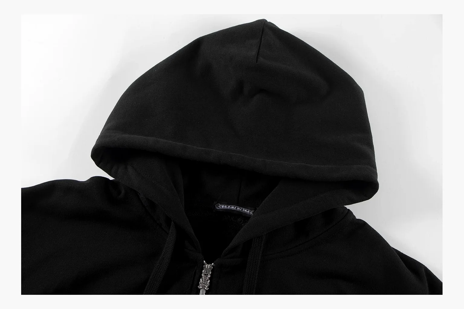 Chrome Hearts Cross Zip Hoodie Black QC reference photo showing black cotton fleece zip hoodie, large back cross graphic, silver zipper pull, hood drawcords, and front pocket structure thumbnail 6