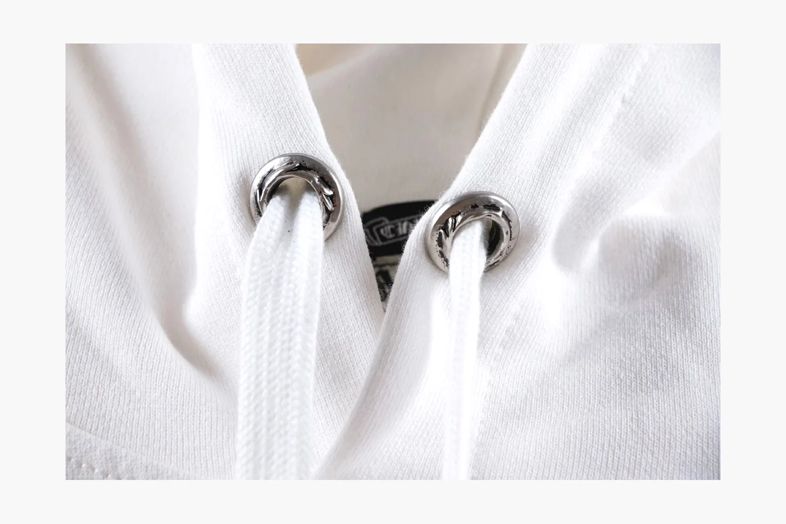 Chrome Hearts White Cross Zip Hoodie QC reference photo showing white cotton fleece zip hoodie, cross back artwork, drawcord hood, sleeve print, front zipper, and ribbed trim