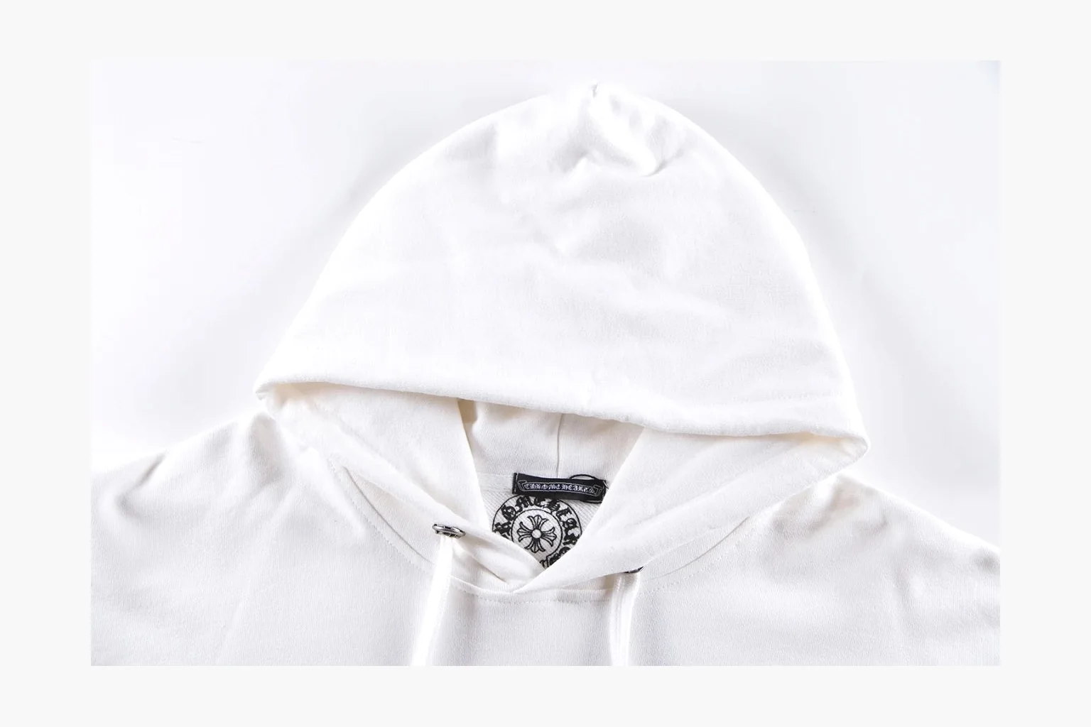 Chrome Hearts White Cross Zip Hoodie QC reference photo showing white cotton fleece zip hoodie, cross back artwork, drawcord hood, sleeve print, front zipper, and ribbed trim thumbnail 3