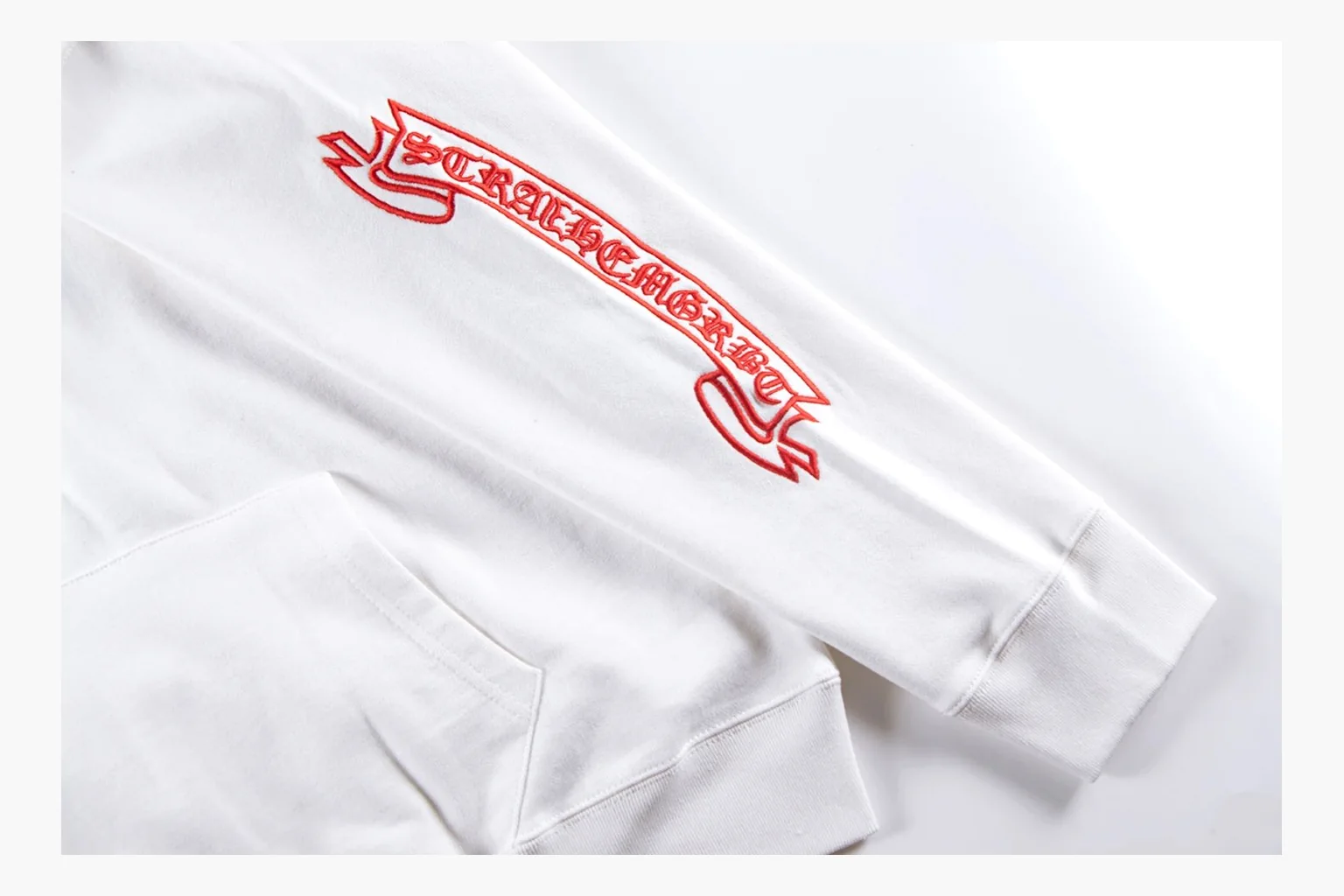 Chrome Hearts White Cross Zip Hoodie QC reference photo showing white cotton fleece zip hoodie, cross back artwork, drawcord hood, sleeve print, front zipper, and ribbed trim thumbnail 4