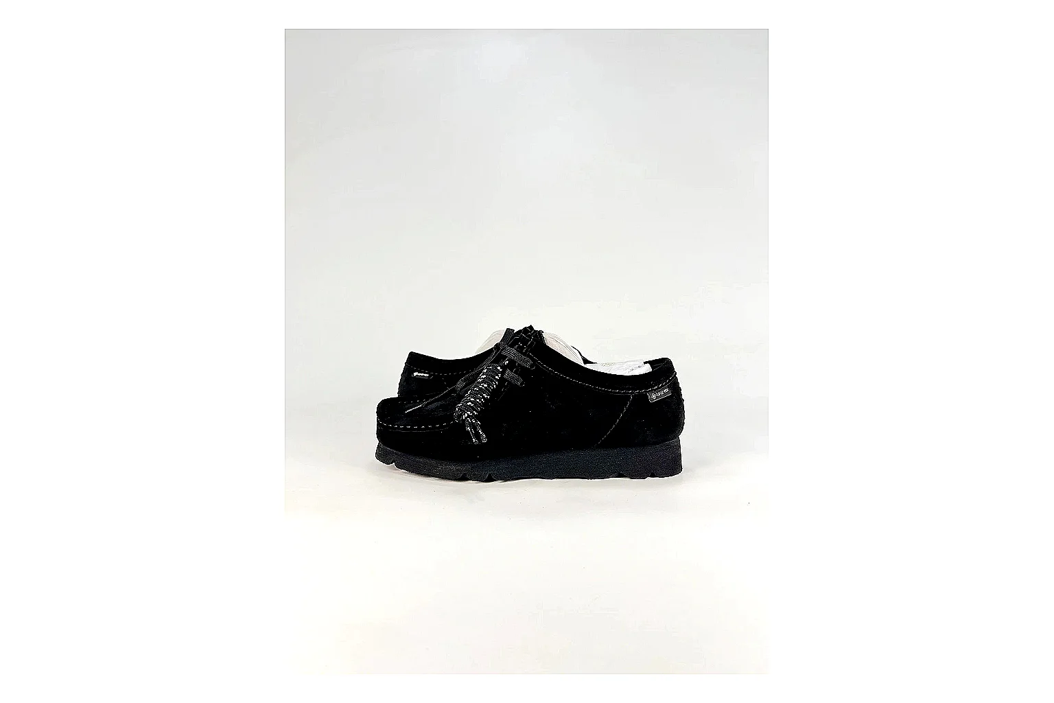 Clarks Wallabee Black Sneakers QC photo reference showing black suede Wallabee shoes with suede texture, side-profile shape, upper panel lines, and outsole detail