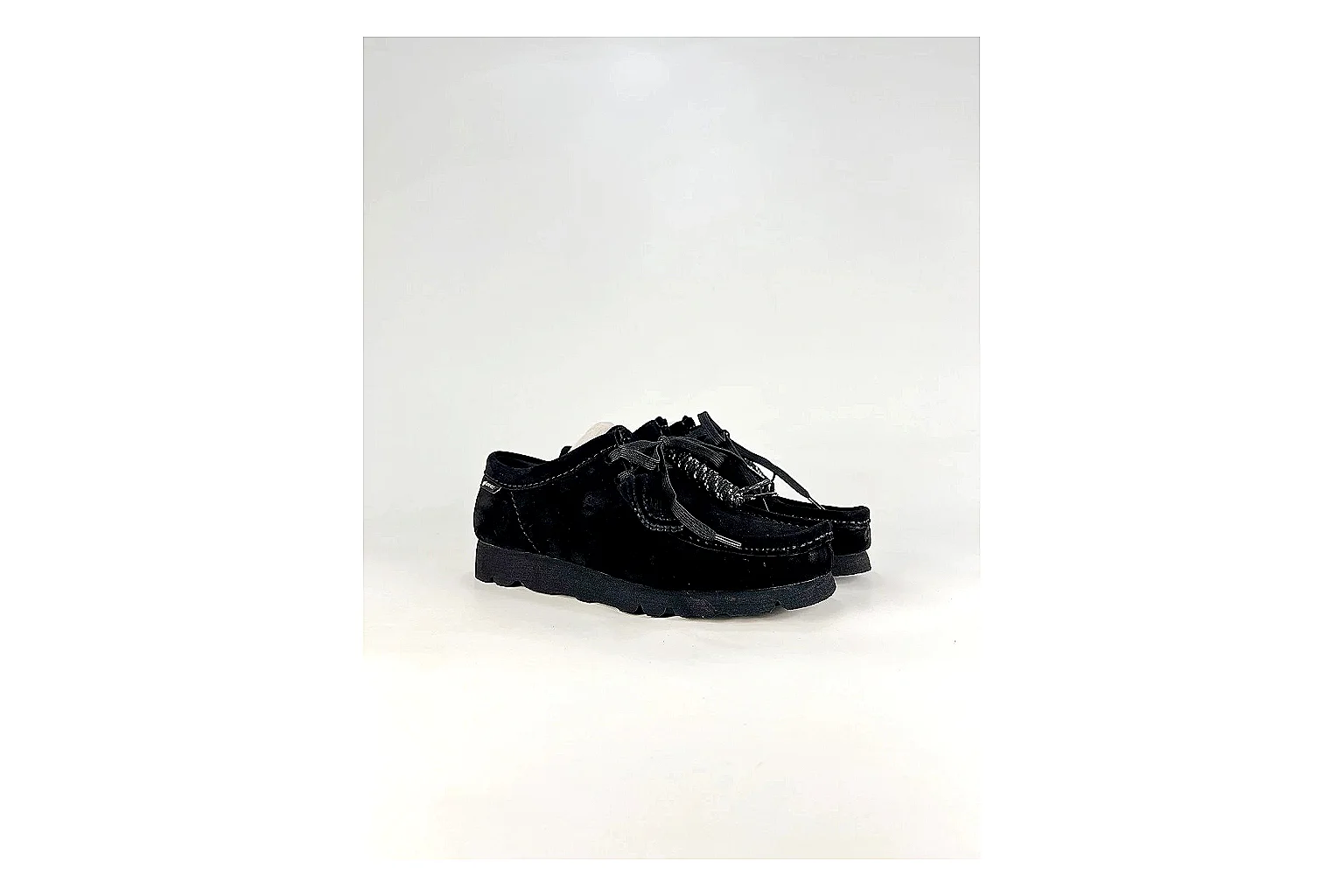 Clarks Wallabee Black Sneakers QC photo reference showing black suede Wallabee shoes with suede texture, side-profile shape, upper panel lines, and outsole detail thumbnail 5