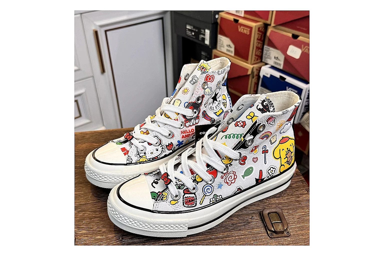 Converse Hello Kitty Chuck 70 High Top QC reference photo showing white canvas high-top upper, colorful character graphics, metal eyelets, rubber toe cap, and elevated vintage sole thumbnail 5