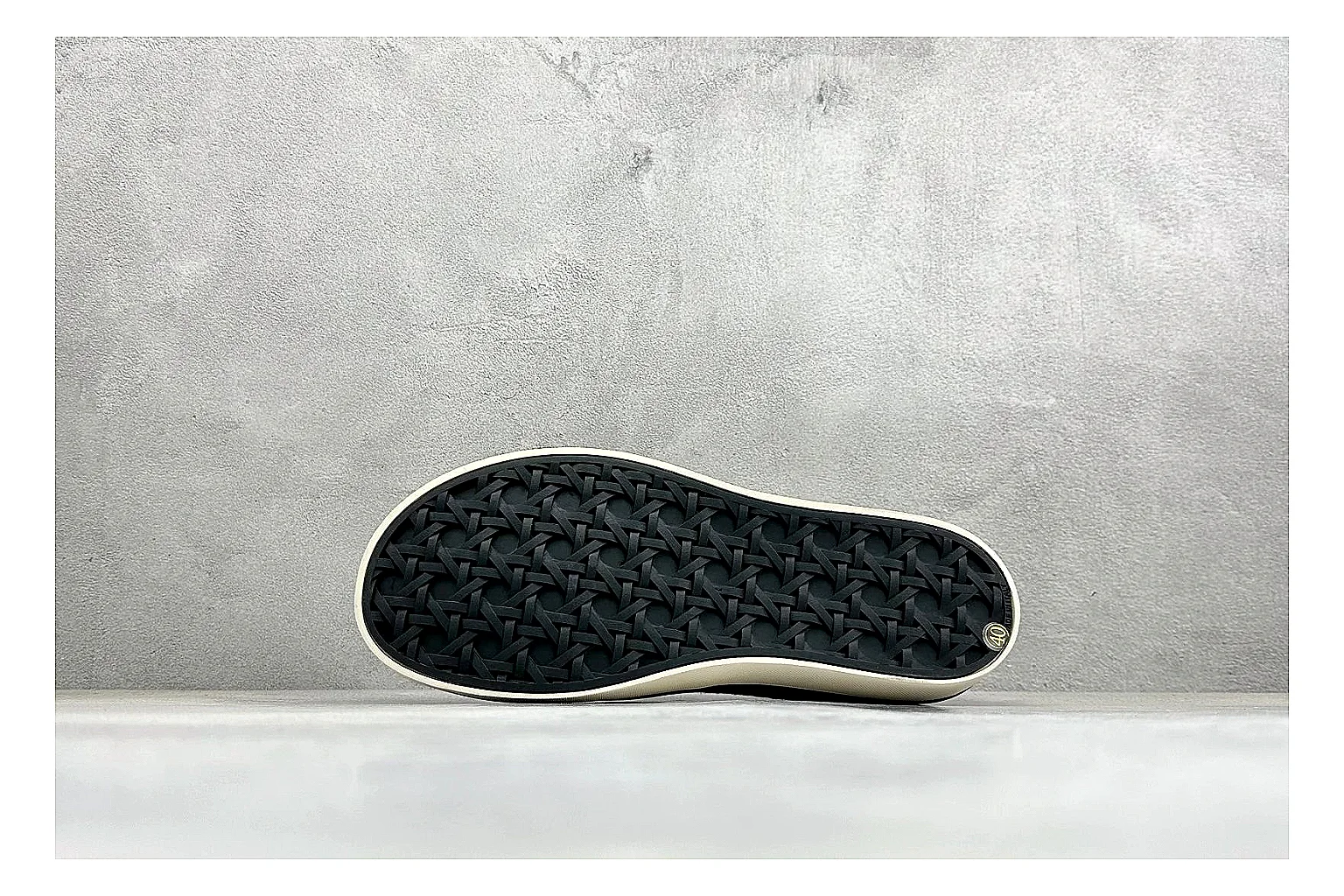 Dior Act Slide Black Low-Top QC reference photo showing black monogram-style upper, low slip-on shape, chunky dark sole, and luxury casual profile thumbnail 3