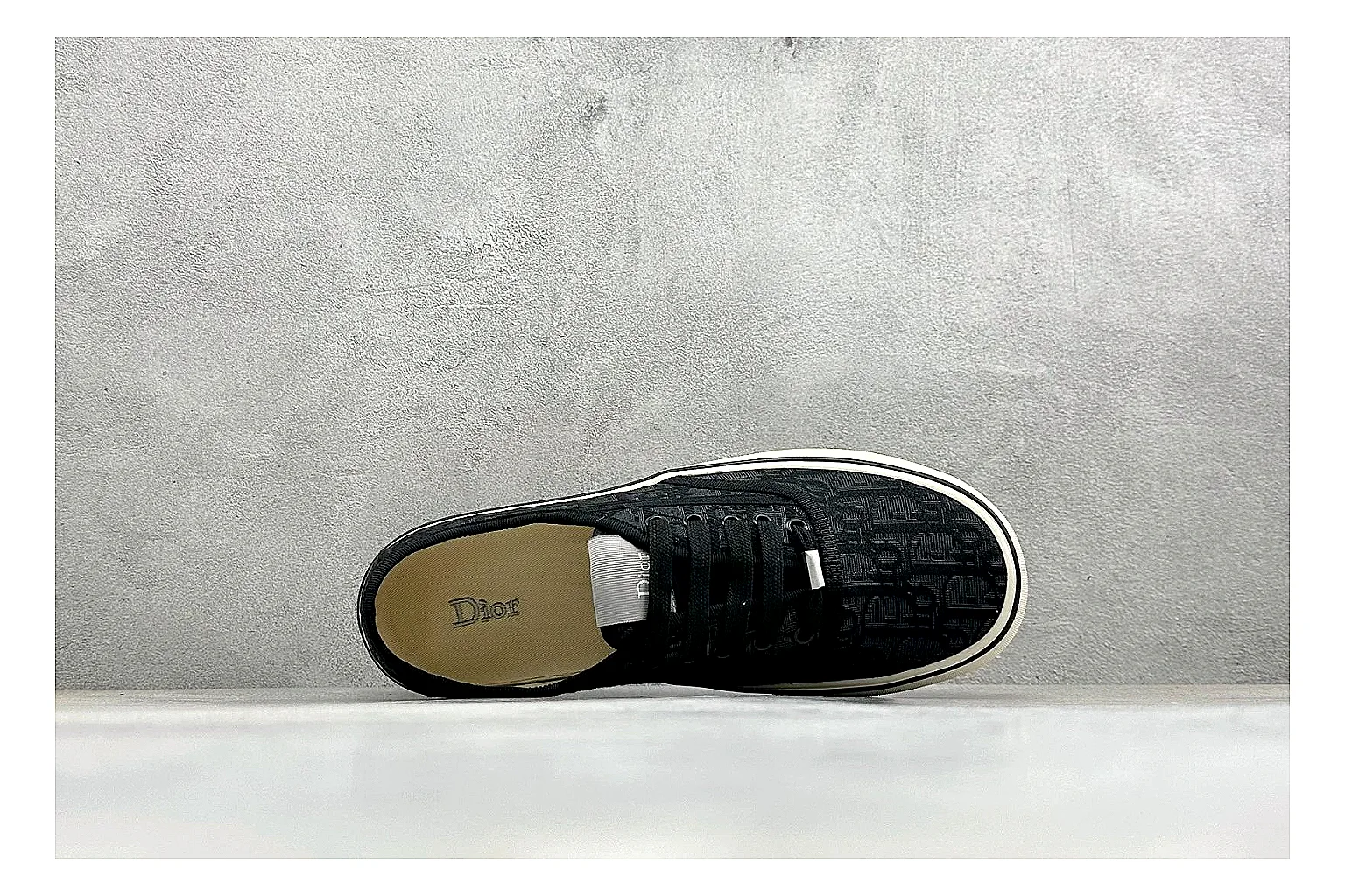 Dior Act Slide Black Low-Top QC reference photo showing black monogram-style upper, low slip-on shape, chunky dark sole, and luxury casual profile thumbnail 6