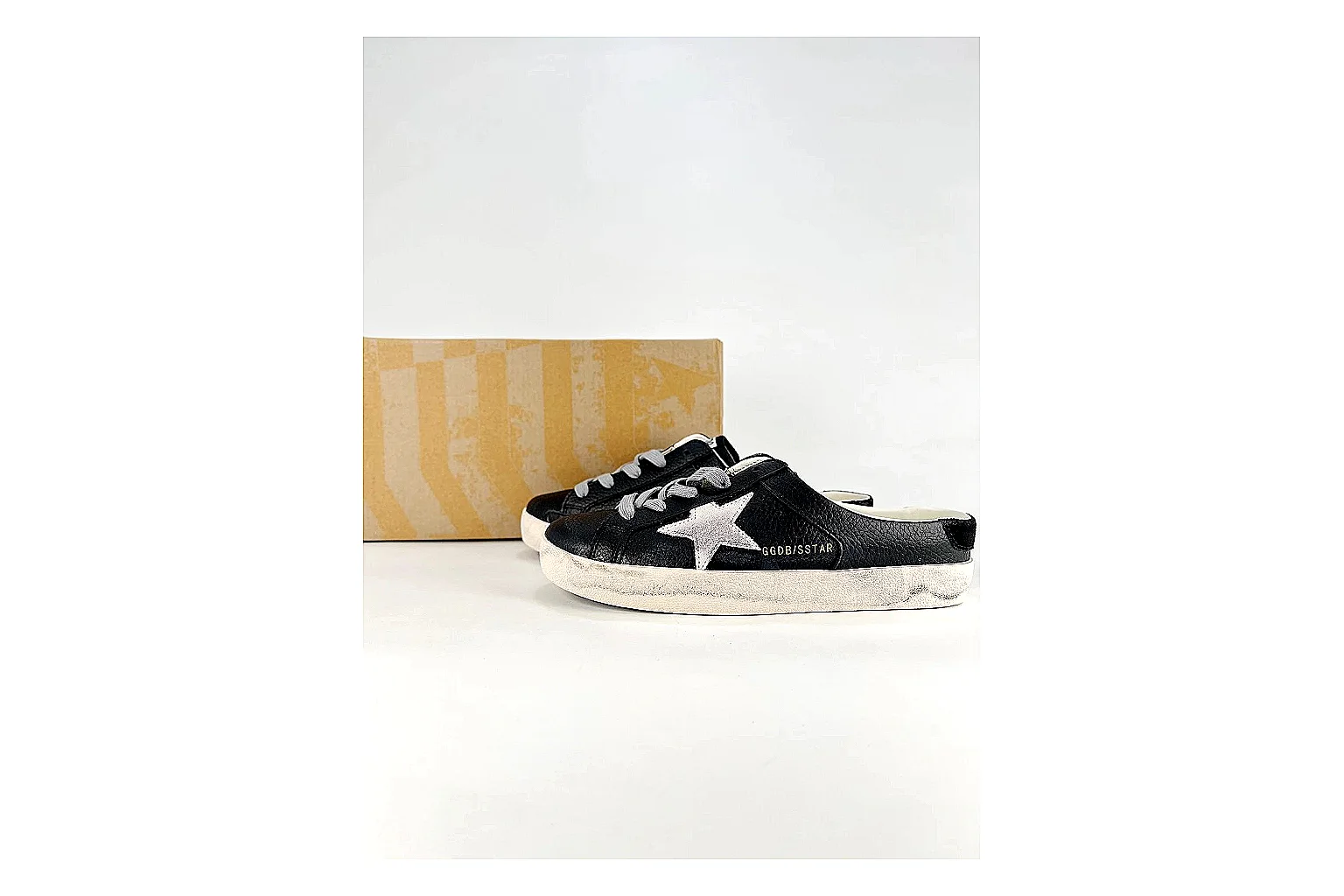 GGDB Super-Star Black White Sneakers QC photo reference showing black white distressed low-top sneakers with leather texture, side-profile shape, upper panel lines, and outsole detail