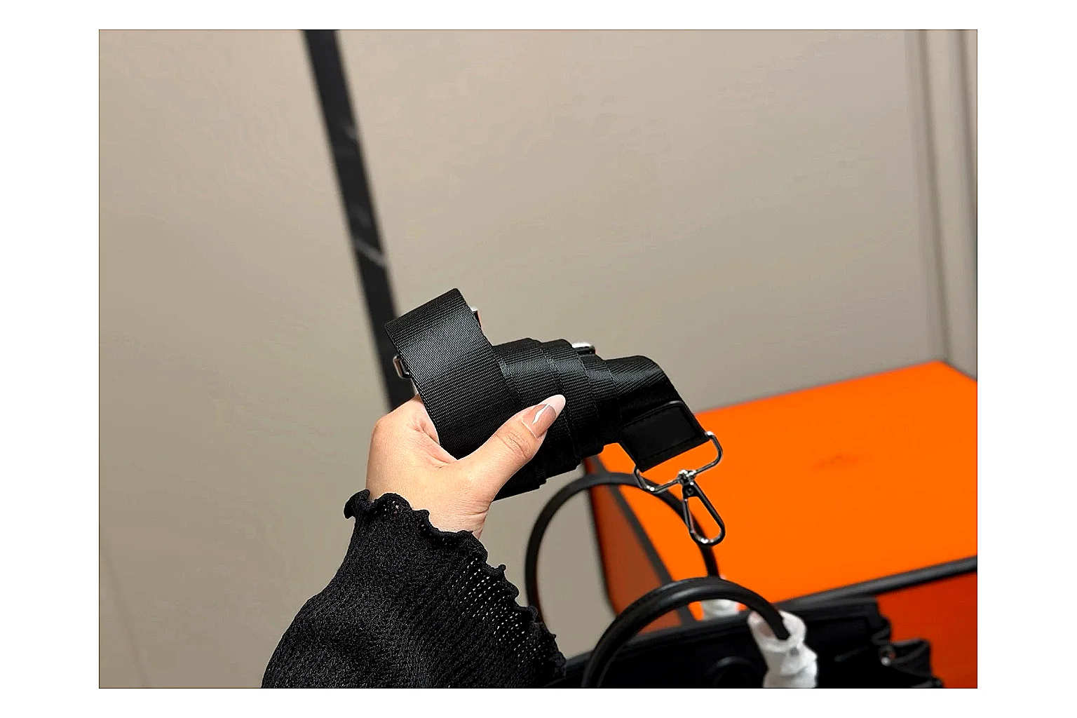 Hermes Birkin Style Black QC reference photo showing black leather structured body, top handles, flap-and-strap shape, and polished hardware thumbnail 6