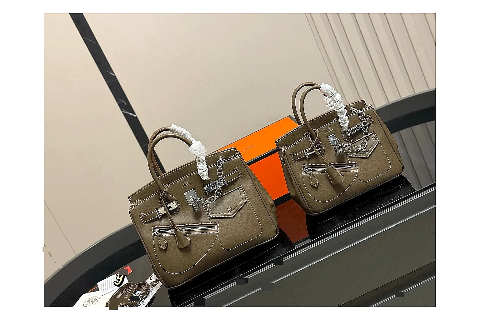 Hermes Birkin Style Olive QC reference photo showing olive leather structured body, top handles, flap-and-strap shape, and polished hardware