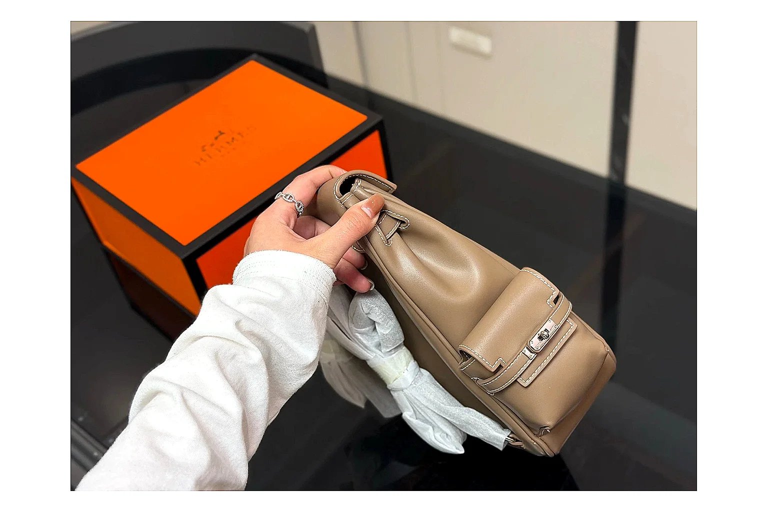 Hermes Kelly Backpack Beige QC reference photo showing beige leather backpack body, Kelly-style flap, top handle, shoulder straps, and polished hardware thumbnail 4