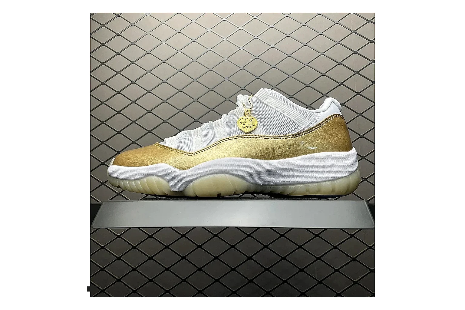 Jordan 11 Low White Gold Sneaker QC photo showing white gold aj11 low sneaker with mixed upper and low top shape