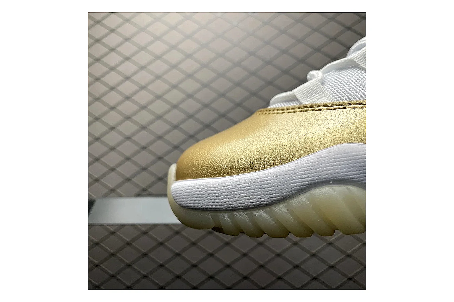 Jordan 11 Low White Gold Sneaker QC photo showing white gold aj11 low sneaker with mixed upper and low top shape thumbnail 4