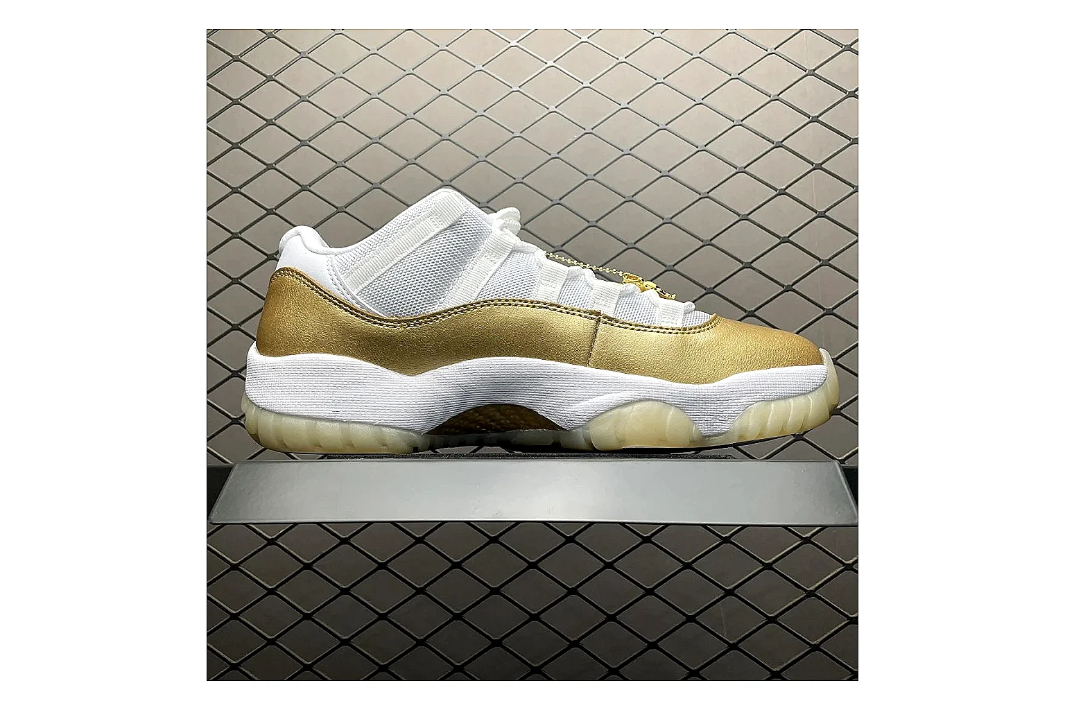 Jordan 11 Low White Gold Sneaker QC photo showing white gold aj11 low sneaker with mixed upper and low top shape thumbnail 6