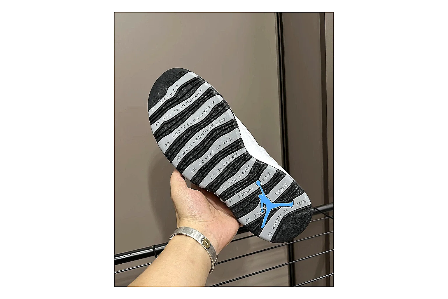 Jordan Air Jordan 10 Steel White Black QC reference photo showing white and black high-top court upper, striped lace panels, Jumpman heel branding, and retro sole thumbnail 4