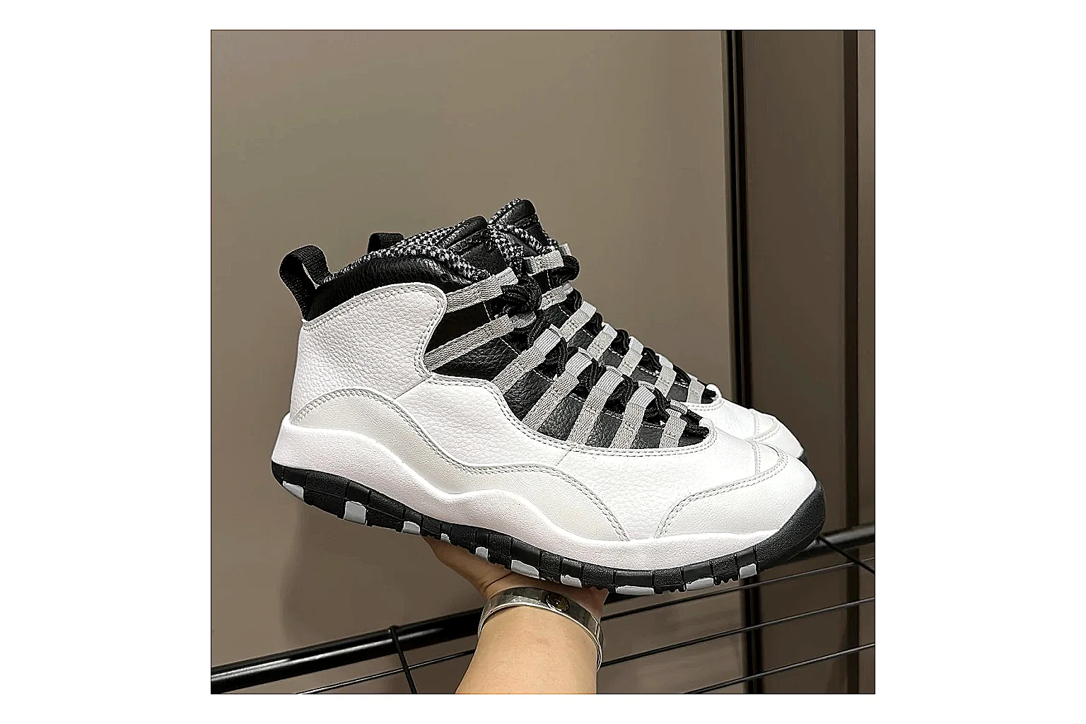 Jordan Air Jordan 10 Steel White Black QC reference photo showing white and black high-top court upper, striped lace panels, Jumpman heel branding, and retro sole thumbnail 5