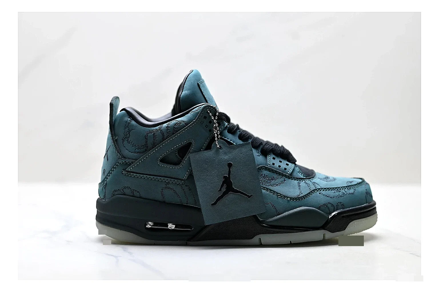 Jordan Air Jordan 4 Teal Black Sneakers QC photo reference showing teal black retro basketball sneakers with nubuck texture, side-profile shape, upper panel lines, and outsole detail