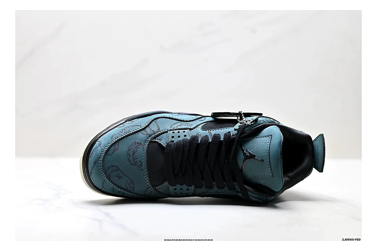 Jordan Air Jordan 4 Teal Black Sneakers QC photo reference showing teal black retro basketball sneakers with nubuck texture, side-profile shape, upper panel lines, and outsole detail thumbnail 6