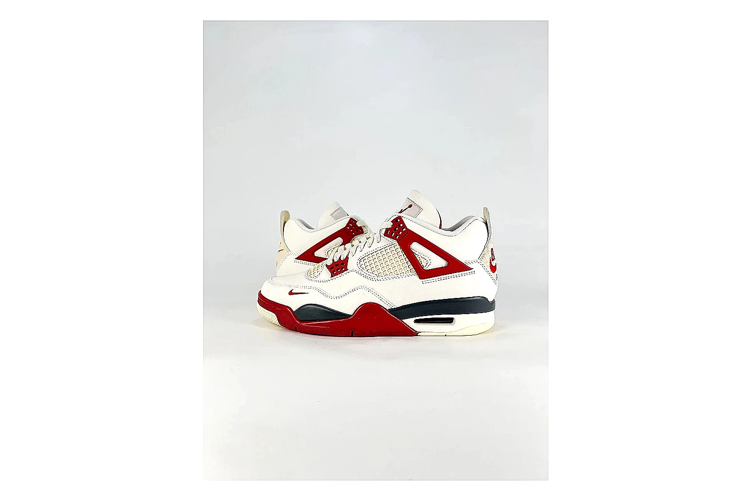 Jordan Air Jordan 4 White Red Sneakers QC photo reference showing white red retro basketball sneakers with leather texture, side-profile shape, upper panel lines, and outsole detail