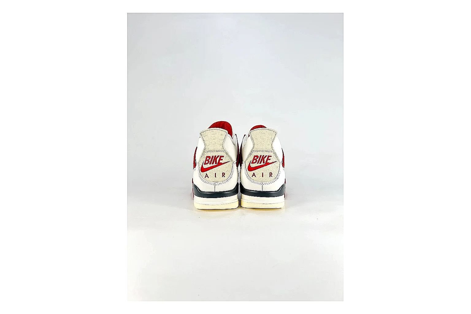 Jordan Air Jordan 4 White Red Sneakers QC photo reference showing white red retro basketball sneakers with leather texture, side-profile shape, upper panel lines, and outsole detail thumbnail 2