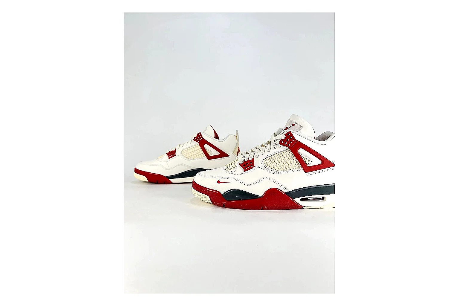 Jordan Air Jordan 4 White Red Sneakers QC photo reference showing white red retro basketball sneakers with leather texture, side-profile shape, upper panel lines, and outsole detail thumbnail 4
