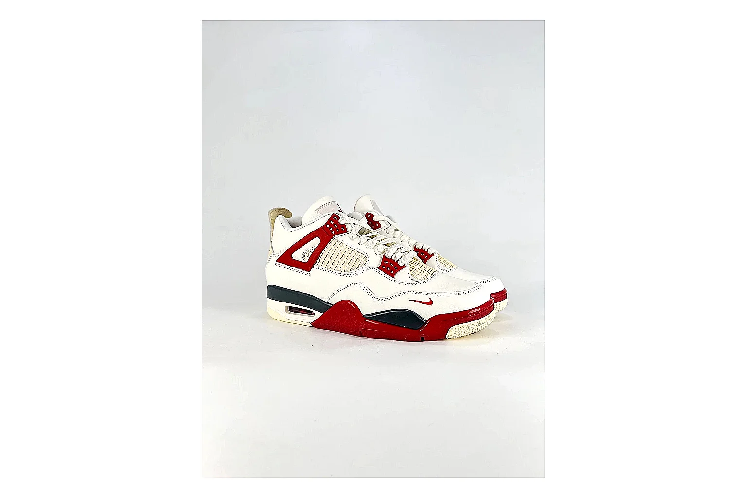 Jordan Air Jordan 4 White Red Sneakers QC photo reference showing white red retro basketball sneakers with leather texture, side-profile shape, upper panel lines, and outsole detail thumbnail 5