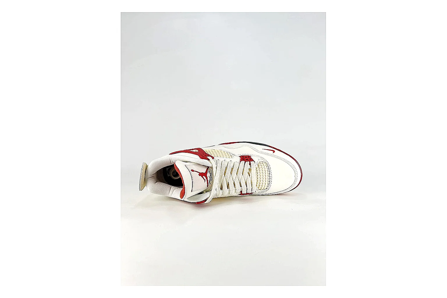 Jordan Air Jordan 4 White Red Sneakers QC photo reference showing white red retro basketball sneakers with leather texture, side-profile shape, upper panel lines, and outsole detail thumbnail 6