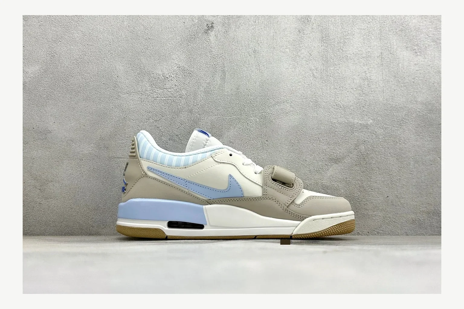 Jordan Air Jordan 4 Blue Sneaker QC photo showing white blue air jordan 4 retro with mixed-material upper and low-profile shape
