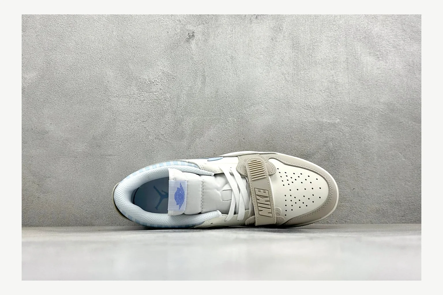 Jordan Air Jordan 4 Blue Sneaker QC photo showing white blue air jordan 4 retro with mixed-material upper and low-profile shape thumbnail 6