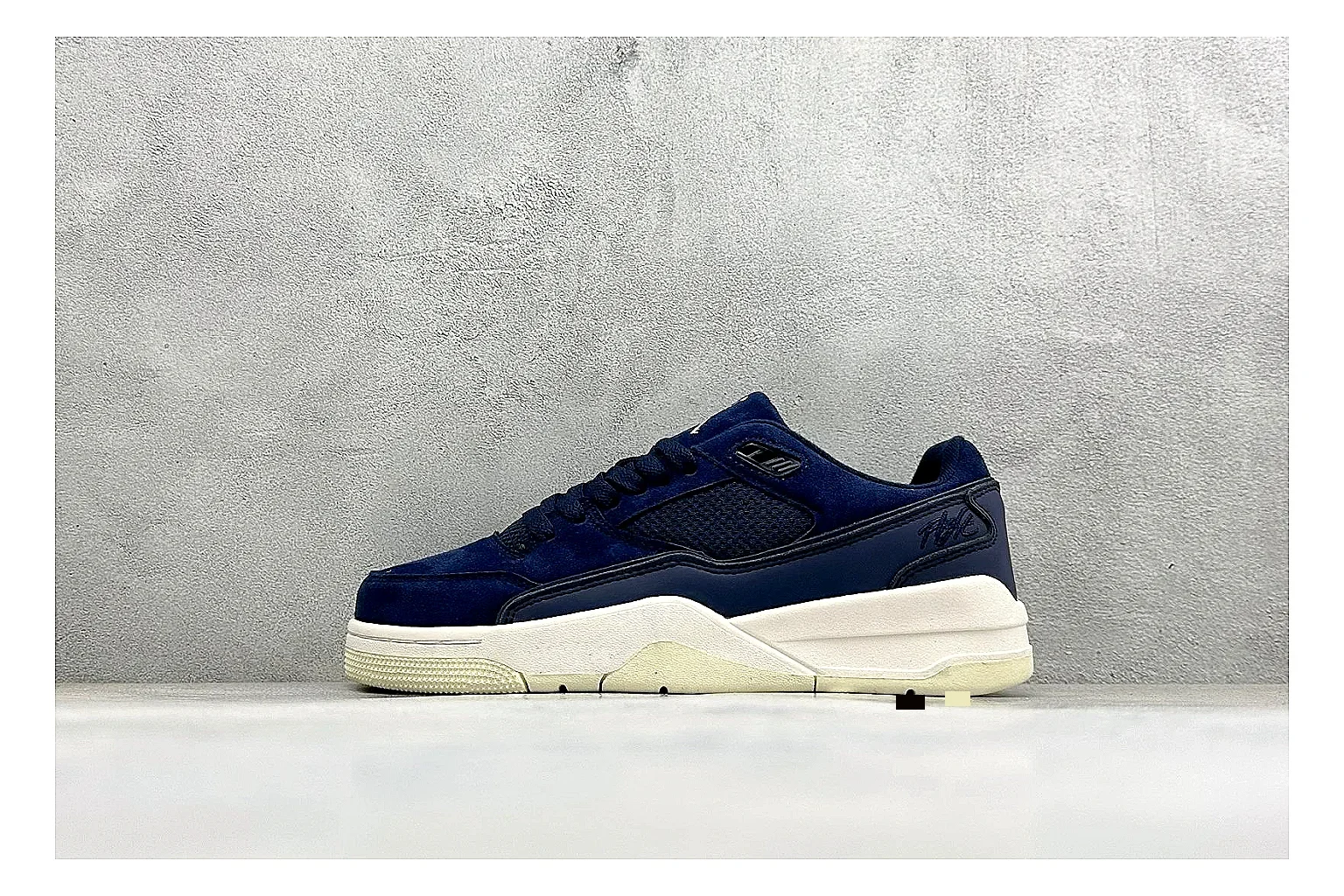 Jordan Flight Navy Suede QC reference photo showing navy suede upper, low court silhouette, cream sole, and soft retro basketball profile
