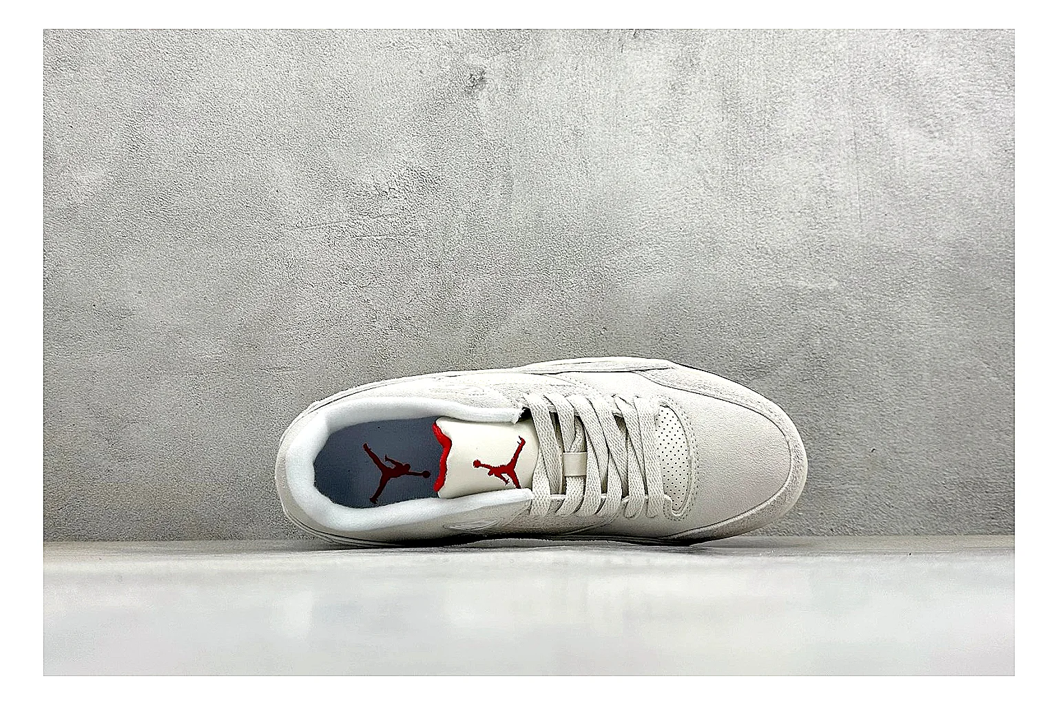 Jordan Flight White QC reference photo showing white low court upper, cream sole, simple Jordan styling, and soft retro basketball profile thumbnail 6