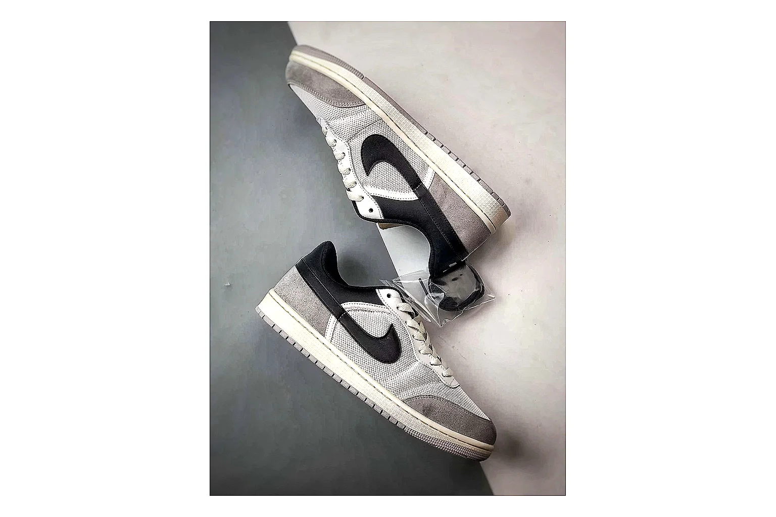 Jordan Low Black White Sneaker QC photo showing white black low-top sneaker with mixed-material upper and low-profile shape thumbnail 3