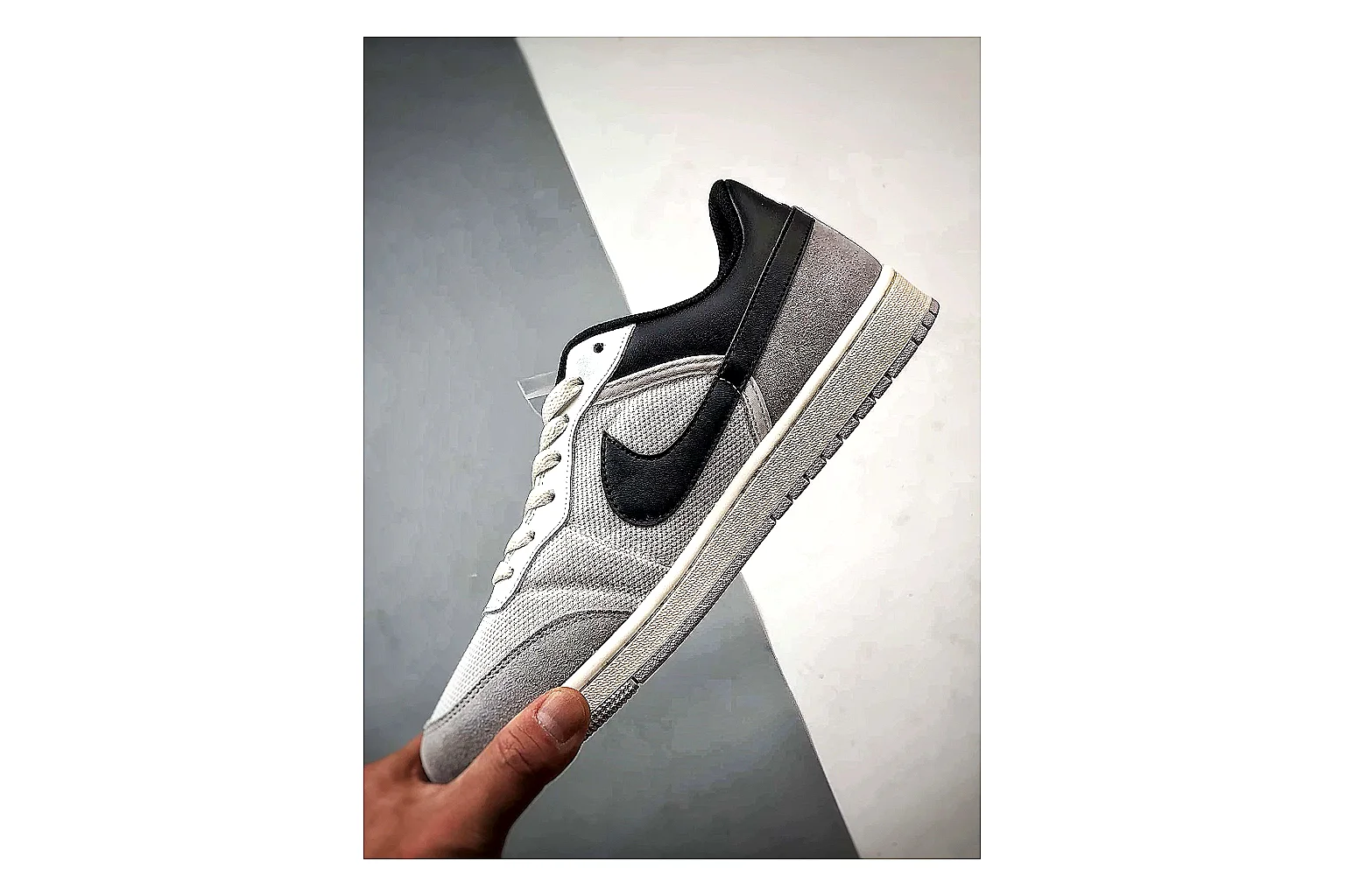 Jordan Low Black White Sneaker QC photo showing white black low-top sneaker with mixed-material upper and low-profile shape thumbnail 4