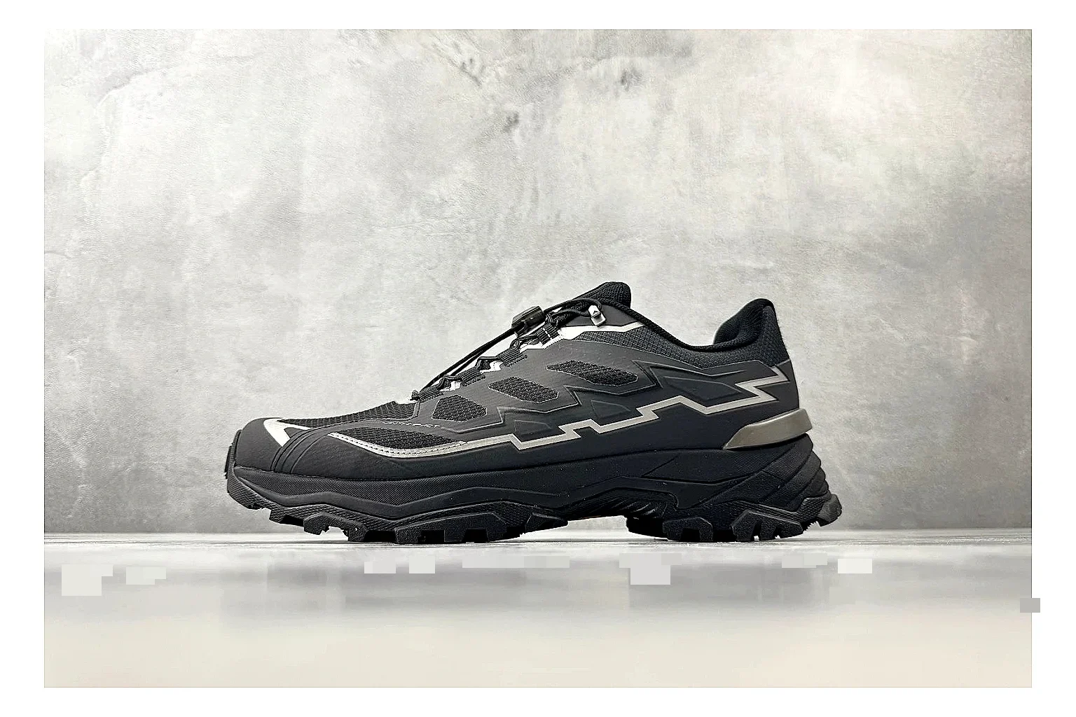 Kailas Fuga Black Vibram QC reference photo showing black trail upper, Vibram outsole, reinforced overlays, and rugged outdoor running shape