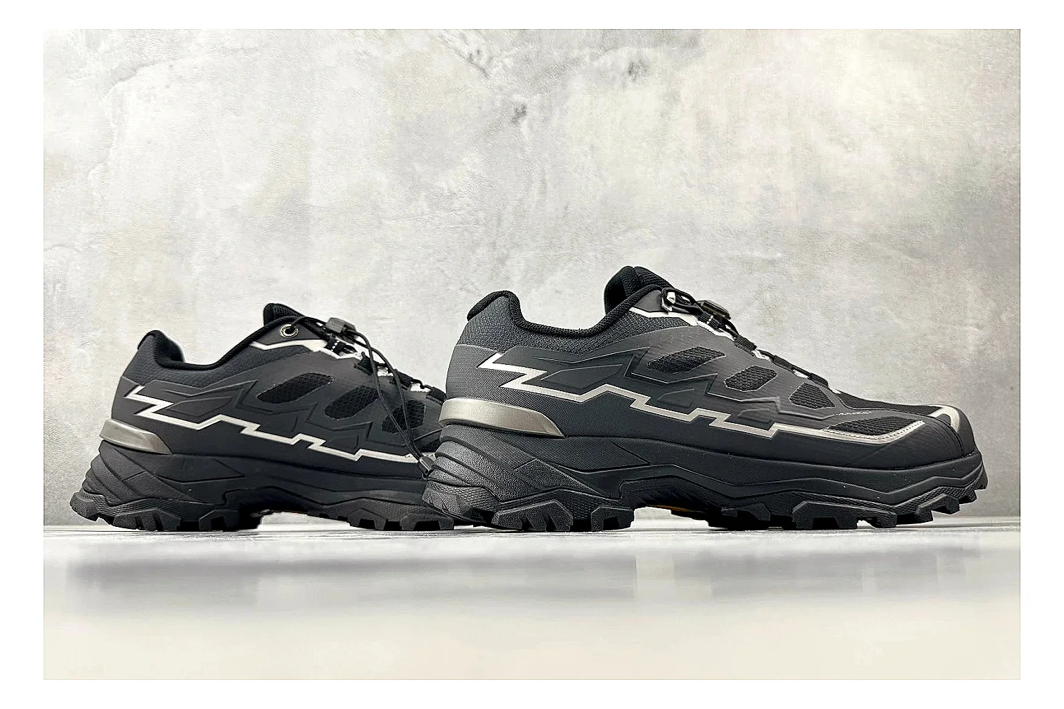 Kailas Fuga Black Vibram QC reference photo showing black trail upper, Vibram outsole, reinforced overlays, and rugged outdoor running shape