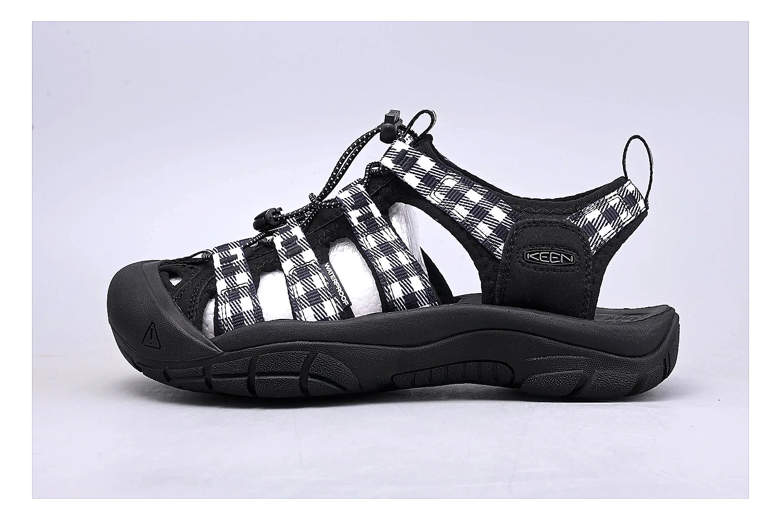 KEEN Zerraport Plaid Sandal QC photo showing white black plaid zerraport outdoor sandal with mixed upper and sandal shape