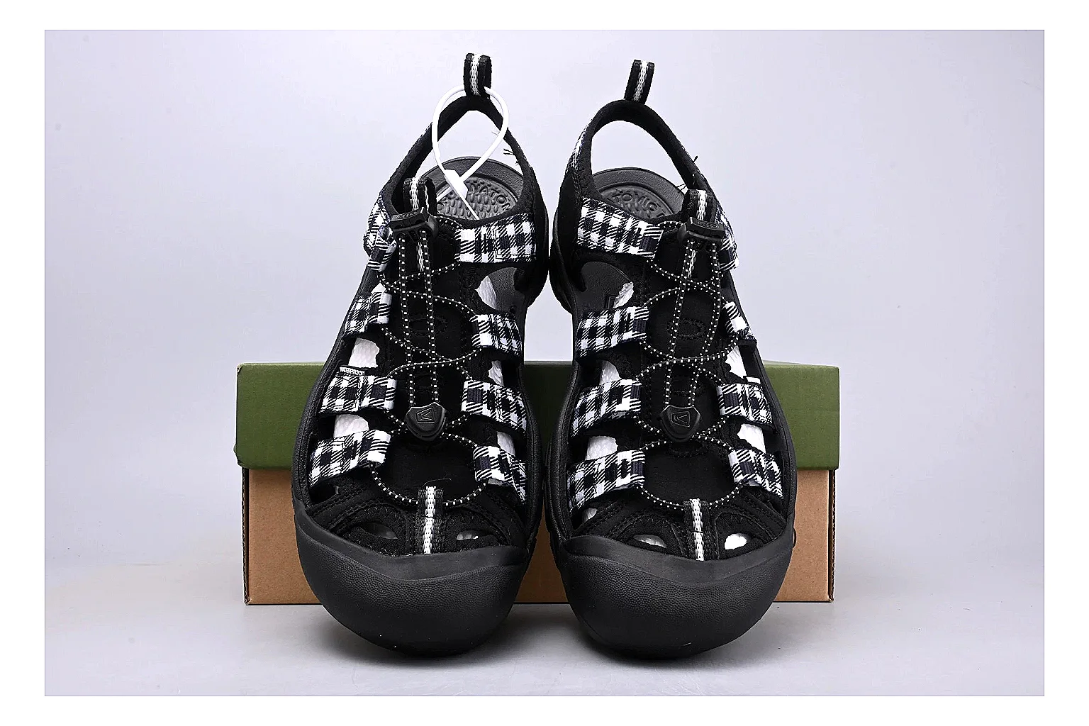 KEEN Zerraport Plaid Sandal QC photo showing white black plaid zerraport outdoor sandal with mixed upper and sandal shape thumbnail 3