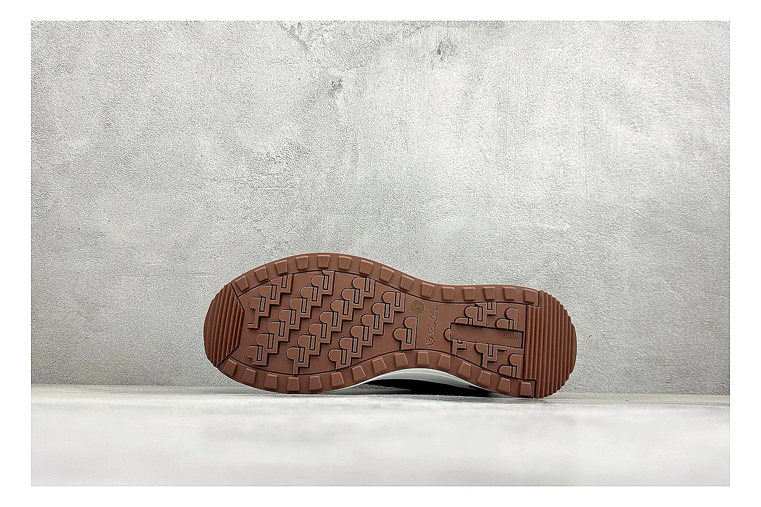 Loro Piana Week-End Black QC reference image showing black suede upper, low casual profile, striped midsole accent, and soft everyday shape thumbnail 3