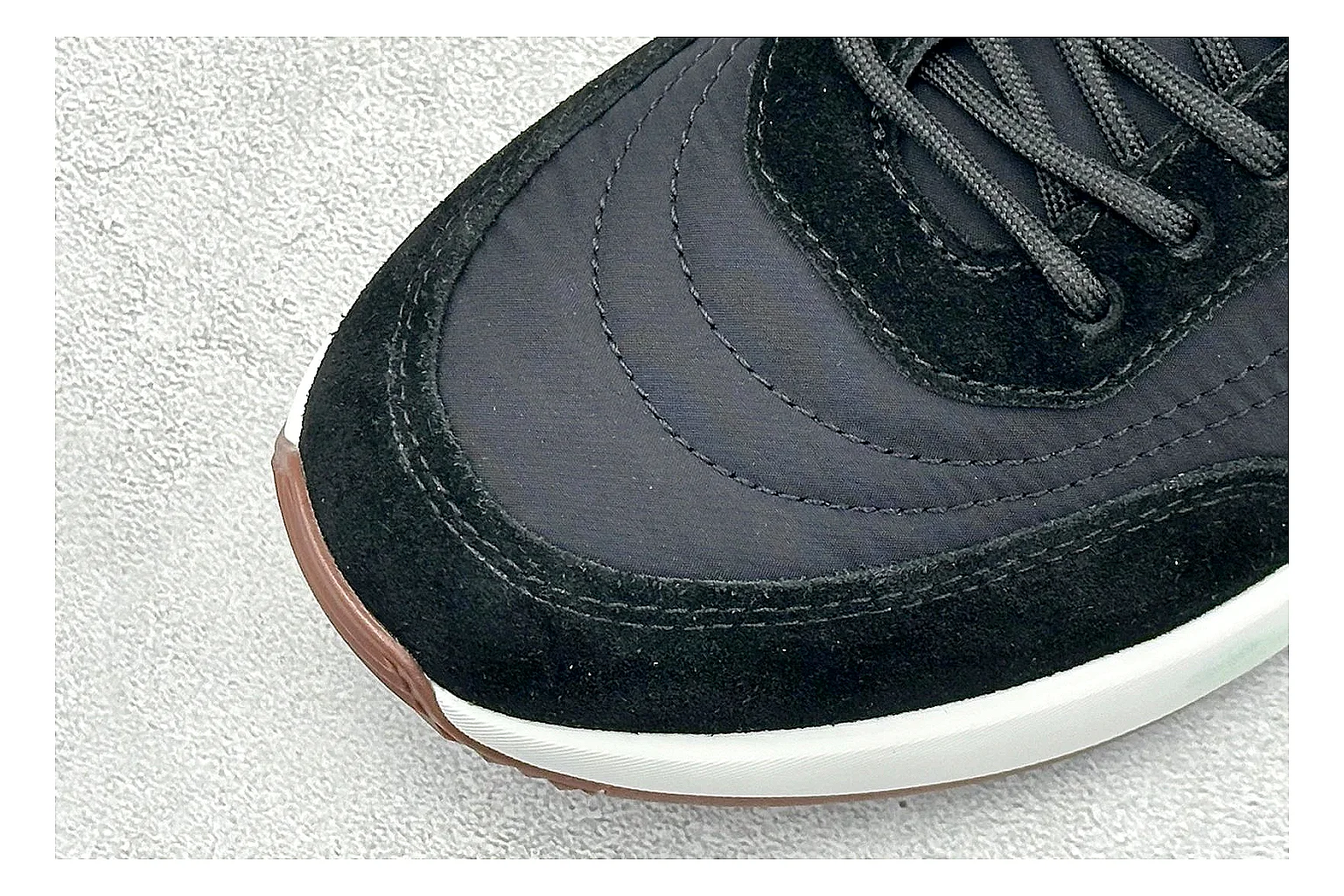 Loro Piana Week-End Black QC reference image showing black suede upper, low casual profile, striped midsole accent, and soft everyday shape thumbnail 4
