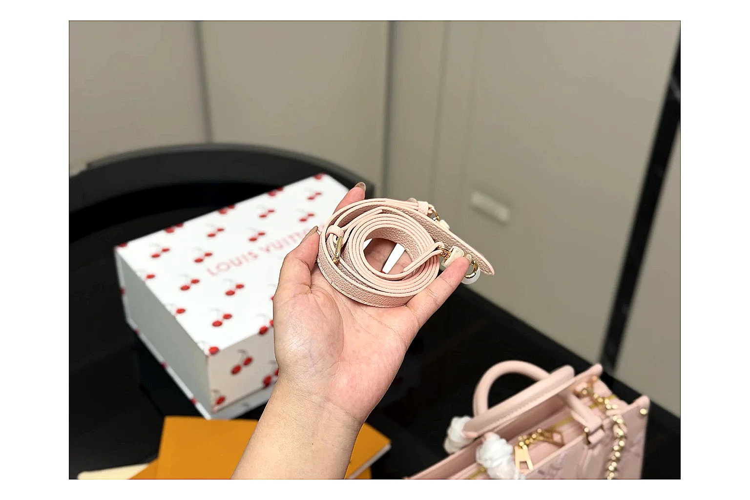 Louis Vuitton Mini Top Handle Pink QC reference photo showing pink leather mini bag body, structured top handle, compact luxury shape, and clean hardware details