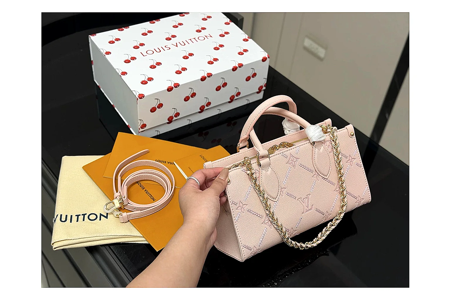 Louis Vuitton Mini Top Handle Pink QC reference photo showing pink leather mini bag body, structured top handle, compact luxury shape, and clean hardware details thumbnail 5