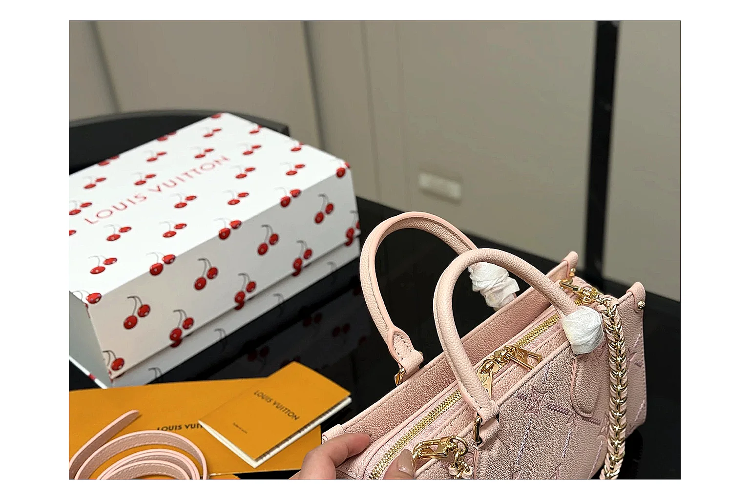 Louis Vuitton Mini Top Handle Pink QC reference photo showing pink leather mini bag body, structured top handle, compact luxury shape, and clean hardware details thumbnail 6