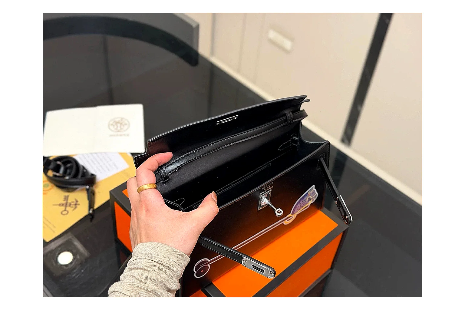 Louis Vuitton Wallet On Chain Black QC reference photo showing black leather wallet-bag body, compact flap shape, chain strap, and polished LV-style hardware thumbnail 3